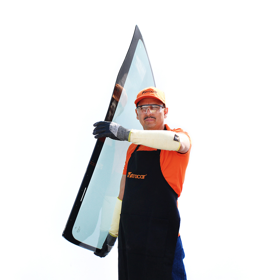 Worker carrying a windshield